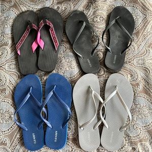 Four pair flip-flops. All fit size 8 1/2.